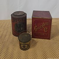Photo showing all three antique tins: Tiger Chewing Tobacco, Gillies Coffee Co, and Armour & Co leaf lard tins arranged on a woven surface