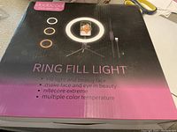 Closed box of the Dodocool Ring Fill Light showing branding, features, and included accessories.