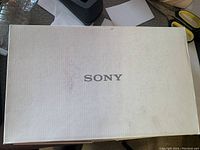 White Sony branded box with some wear visible on the surface and edges.