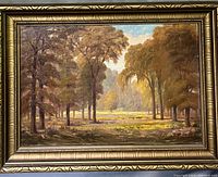 Full front view of the framed oil painting showing the tree-covered landscape in natural daylight.