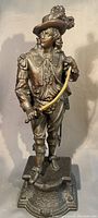 Front view of the bronze patinated spelter statue depicting Don Caesar with detailed clothing and sword.