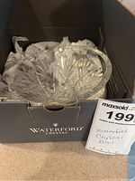 Waterford crystal bowl inside original box with MaxSold tag visible.