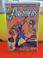Front cover of Avengers #172 comic book showing Hawkeye and other Avengers' faces with title and pricing details.