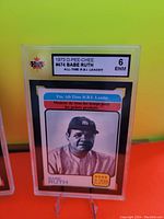 Front photo of the 1973 O-Pee-Chee Babe Ruth card graded KSA 6 showing image of Babe Ruth and grading label