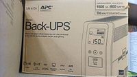 Front of retail box showing APC logo, product name, capacity and runtime.