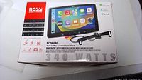 Boss Audio BCPA10RC box front showing product image, features (Apple CarPlay, Android Auto, Bluetooth), and 340 watts label