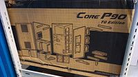 Box showing exploded diagram of Core P90 TG Edition case components and design