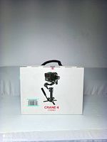 Retail packaging box labeled CRANE 4 COMBO
