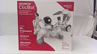 Front view of ClicBot Maker Kit box showing robot image, program and play features, and target age 8+