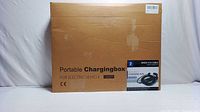 Front view of cardboard box packaging labeled 'Portable Chargingbox for Electric Vehicle Level 2' with CE mark and product image.