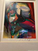 Close-up image of the serigraph print showing the signed and numbered artwork with vibrant colors and abstract female figure.