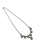 Full view of sterling silver necklace with moonstones on white background showing entire chain and pendant section