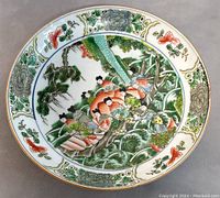 Top view of the Chinese Famille Rose porcelain dish showing colorful hand-painted figures on a boat and floral border.