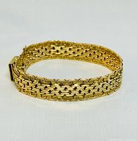 Circular view showing woven multi-strand design and overall condition