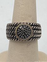 Front view of Effy ring showing black diamond cluster and twisted rope design on band