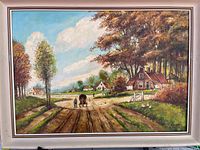 Full view of the framed oil painting showing a fall countryside scene with a horse carriage and houses on a dirt road.