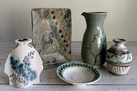 Full view of all pottery items showing size and design detail.