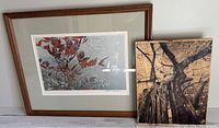Framed limited edition print next to wood slab painting showing overall lot contents