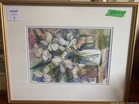 Framed watercolor showing white irises in a glass vase with soft pastel background colors, signed Dorthea Weise, measuring approximately 21.5 by 17.5 inches.