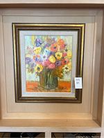 Full view of framed painting showing entire bouquet and frame