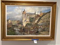 Full view of framed cityscape painting showing gilt wood frame and complete composition