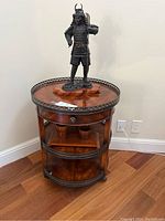 Full lot: sculpture atop bar cart with baskets