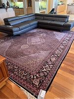 Top view of full rug under sofa