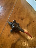 Top-front view showing whistle spout and coral soother attachment