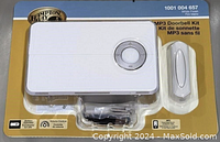 Photo showing the Hampton Bay Wireless MP3 Doorbell Kit in original sealed packaging. The kit includes the main receiver with volume dial, wireless push button, and installation screws.