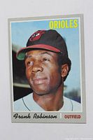 Front image of 1970 Topps Frank Robinson baseball card showing portrait and team/position text