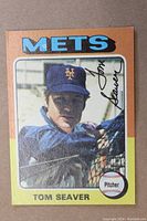 Front of the 1975 Topps Tom Seaver baseball card showing a color photo of Tom Seaver in Mets uniform, team name and facsimile autograph.