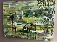 Front view of the original abstract floral painting with vibrant green background and red poppies, signed Sofia.