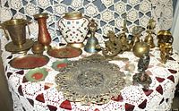 Image showing full collection of brass and enamel decorative items including vases, plates, bowls, bell, and ornate brass filigree plate