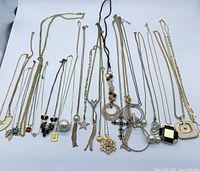 Overview of all necklaces laid out on white background