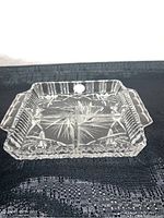 Overall view of the vintage Bohemia crystal relish dish showing shape, compartments and cut design.