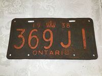 Front view of the vintage 1938 Ontario license plate showing embossed numbers 369J1, year 1938, crown emblem and Ontario text.