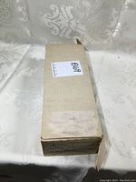 Closed cardboard box containing hockey cards.