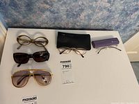 Overview of five eyewear items on table