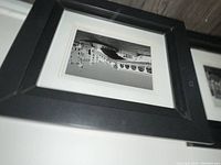 Framed black and white photograph featuring Italy architectural bridge, in black frame with white mat.