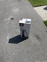 Front and side view of the sealed Outland hand air pump box with product image and branding.