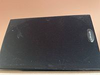 Two Polk Audio speakers with black fabric front and Polk Audio logo on the bottom right corner.