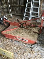 Front view of entire rotary cutter showing deck and hitch frame