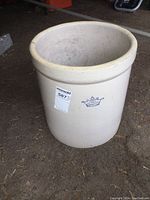Full view of 6 gallon stoneware crock showing overall shape, color, and label.