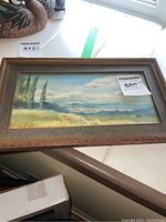 Framed watercolor landscape painting showing the full artwork and frame.
