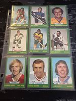 Front view of 9 O-Pee-Chee hockey trading cards featuring players Jim Pappin, Ron Schock, Gary Edwards, Fred Harvey, Boo Stewart, Doug Jarrett, Pierre Larue, Doug Mohns, and Don Awrey.