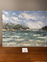 Full view of the signed landscape painting showing the scene and overall condition.