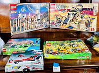 Overall view of all sets: top row shows Harry Potter and Pharaoh's Quest; bottom row shows Championship Challenge, Model Team dragster and Ninjago.