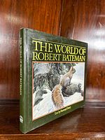 Front cover of the book showing the title and artwork of squirrels in a snowy environment.