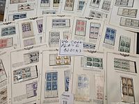 Multiple display pages showing various U.S. postage plate blocks with stamps from different series and years