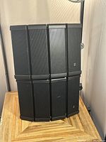 Front view of six line array modules arranged three across and two high